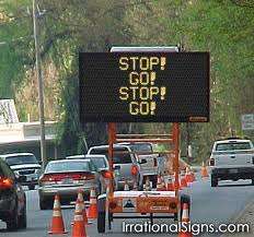 photo of a traffic sign - Stop Go Stop Go