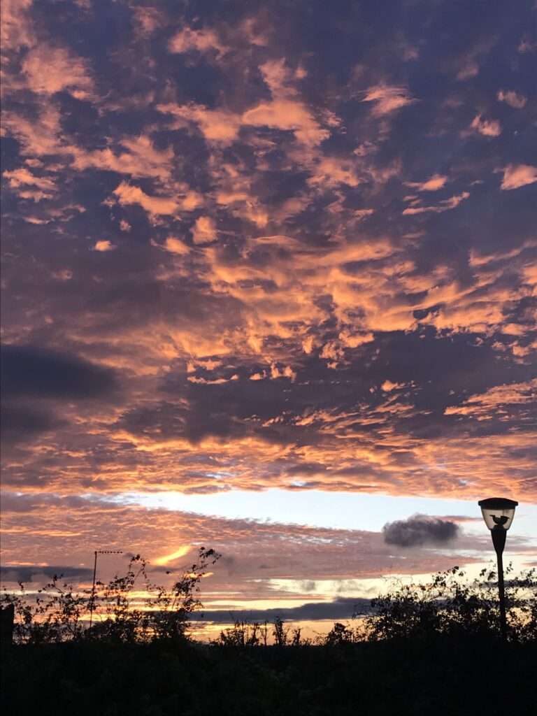 Scorpio, clouds, sunset